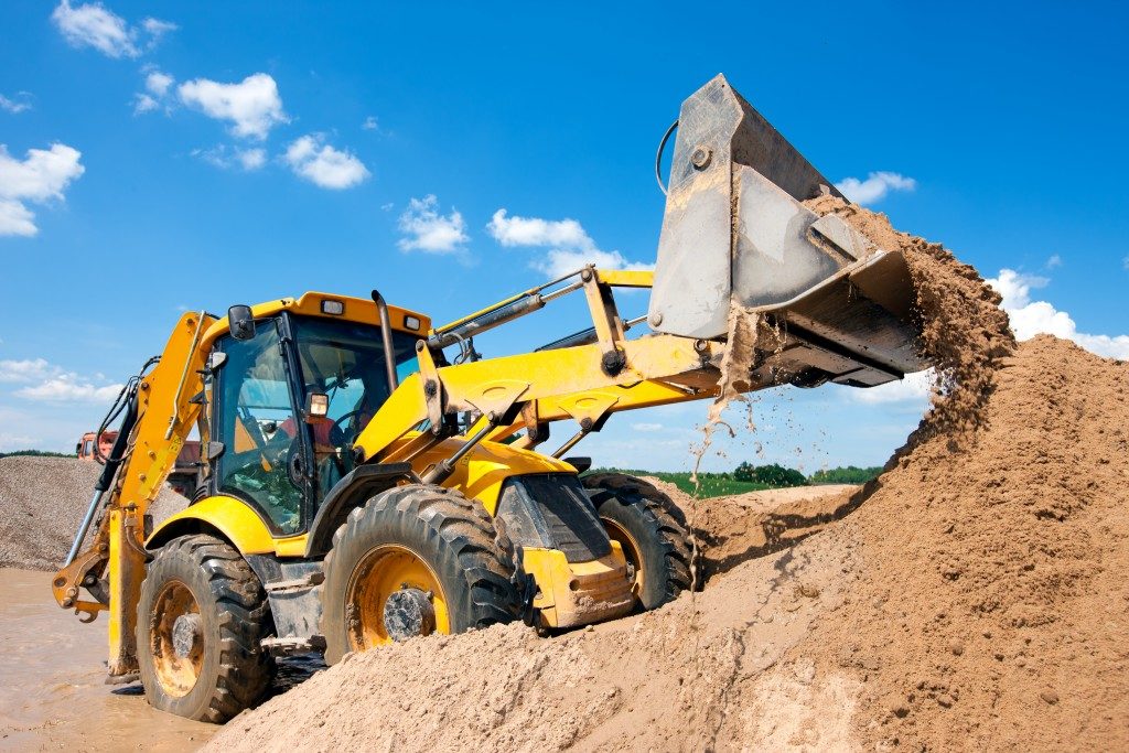 heavy equipment digging dirt