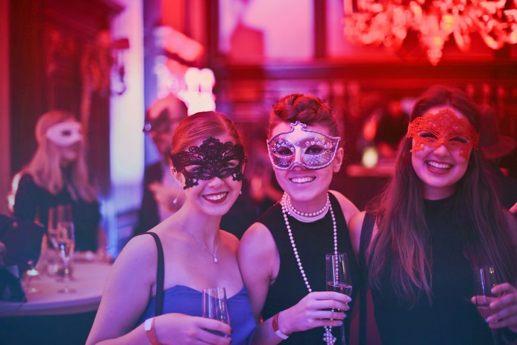 people wearing mask in a party