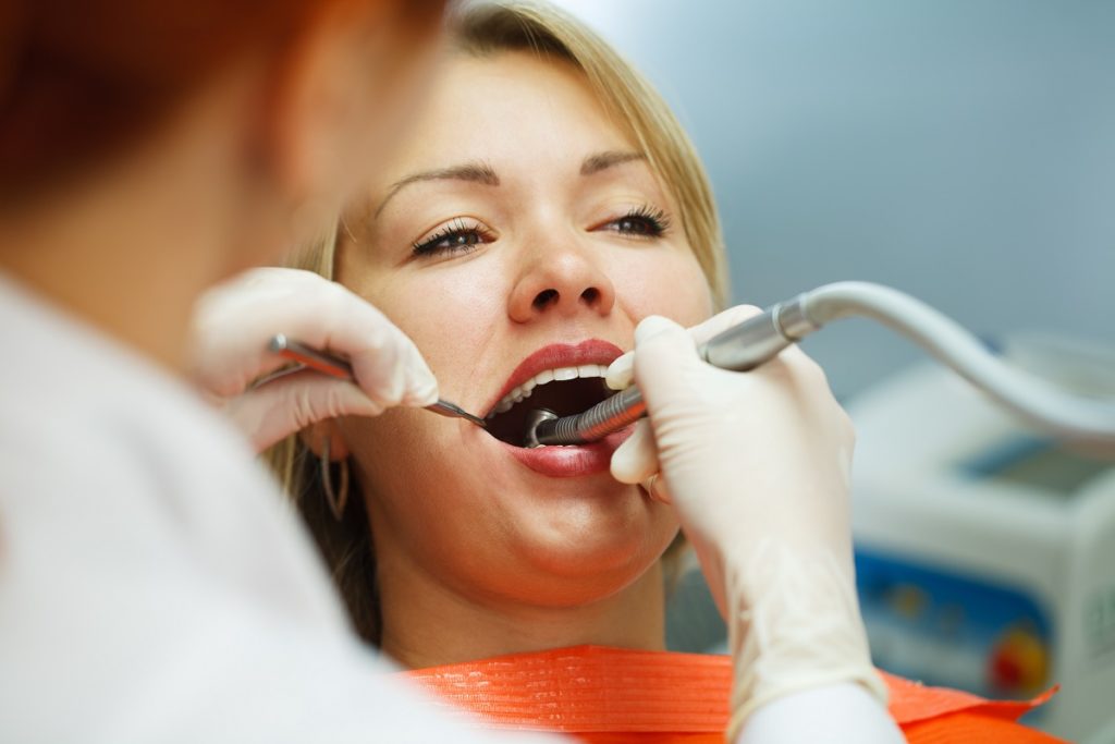 woman consulting a dentist