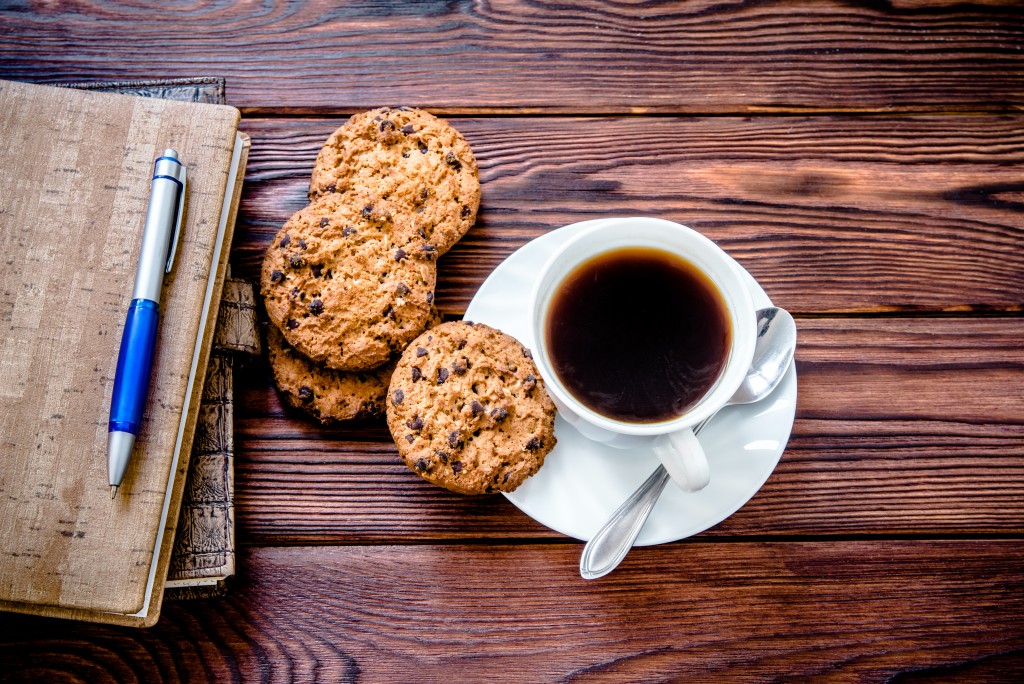 coffee, notebook and cookies