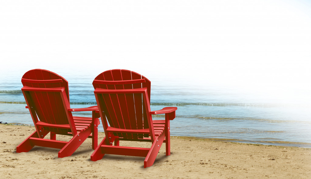 red chairs by the beach